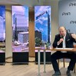 Prezes PHN Wiesław Malicki na tle wizualizacji wstępnych koncepcji biurowca, który ma zastąpić Intra