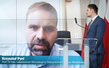 Wirusolog prof. Krzysztof Pyrć (na ekranie) i podsekretarz stanu w MRiRW Krzysztof Ciecióra podczas 