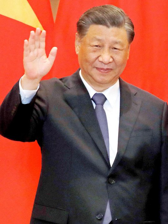 .Chiński prezydent Xi Jinping (z prawej) deklarował natomiast, że bardzo mu zależy na przyłączeniu T