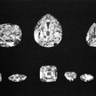 Druga Gwiazda Afryki (pierwszy kamień z lewej w górnym rzędzie) i Wielka Gwiazda Afryki (drugi kamie