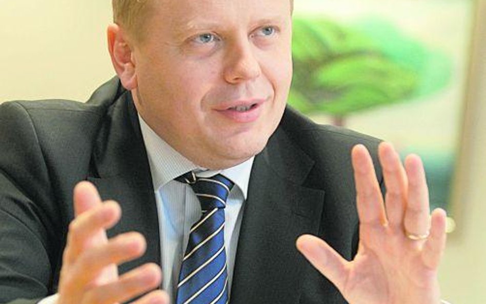 Telekomunikacja Polska, kierowana przez Macieja Wituckiego (u góry), interesuje się spółką ATM Syste