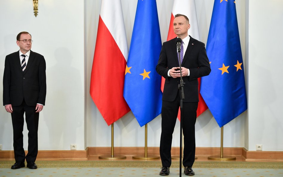 Były minister spraw wewnętrznych i administracji Mariusz Kamiński i prezydent RP Andrzej Duda