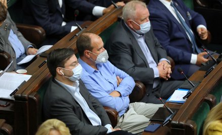 Paweł Kukiz na sali obrad Sejmu.