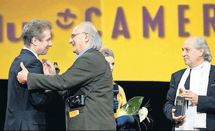 Dyrektor festiwalu Marek Żydowicz z laureatami Carlosem Saurą i Vittoriem Storarą (od lewej)