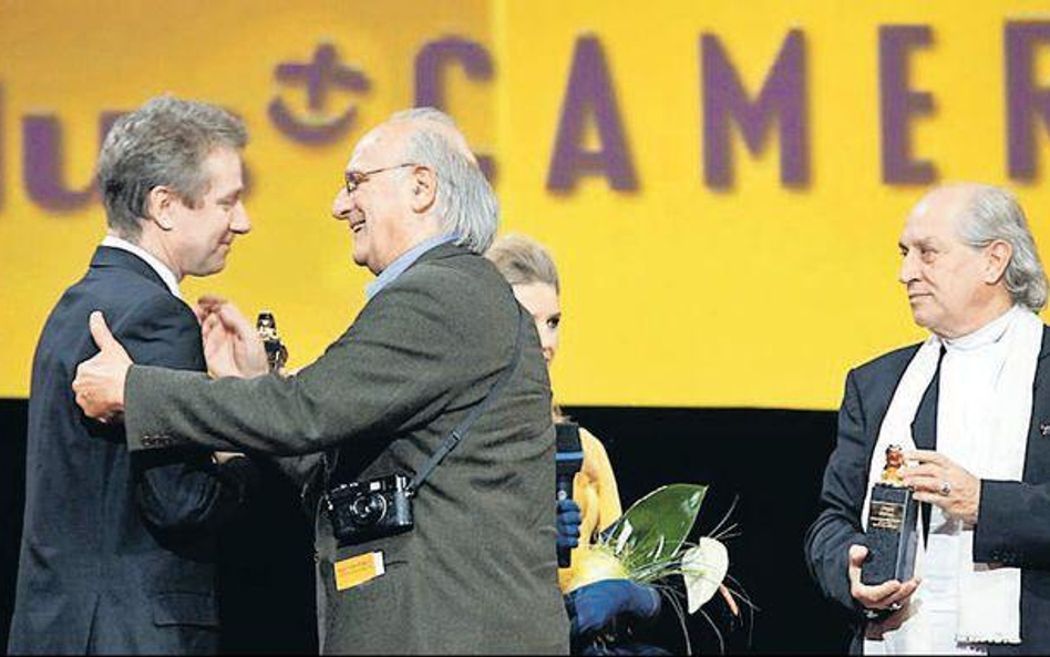 Dyrektor festiwalu Marek Żydowicz z laureatami Carlosem Saurą i Vittoriem Storarą (od lewej)