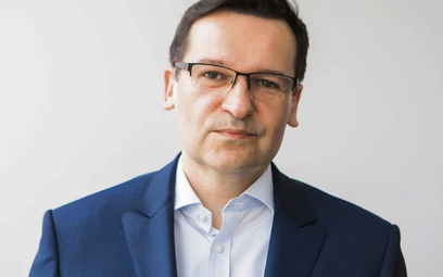 Artur Trunowicz, dyrektor pionu rynku kapitałowego w Asseco Poland.