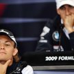 Nico Rosberg, z tyłu Robert Kubica