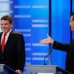 Rick Perry i Mitt Romney podczas debaty