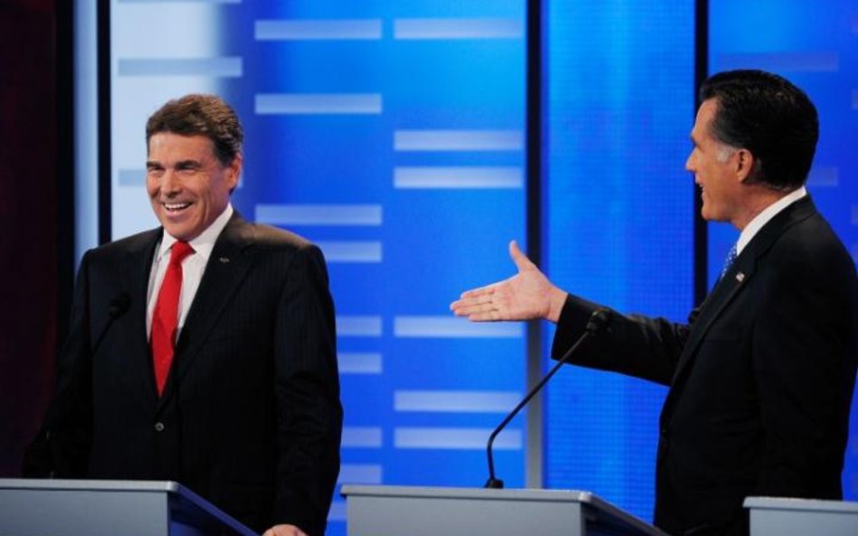 Rick Perry i Mitt Romney podczas debaty