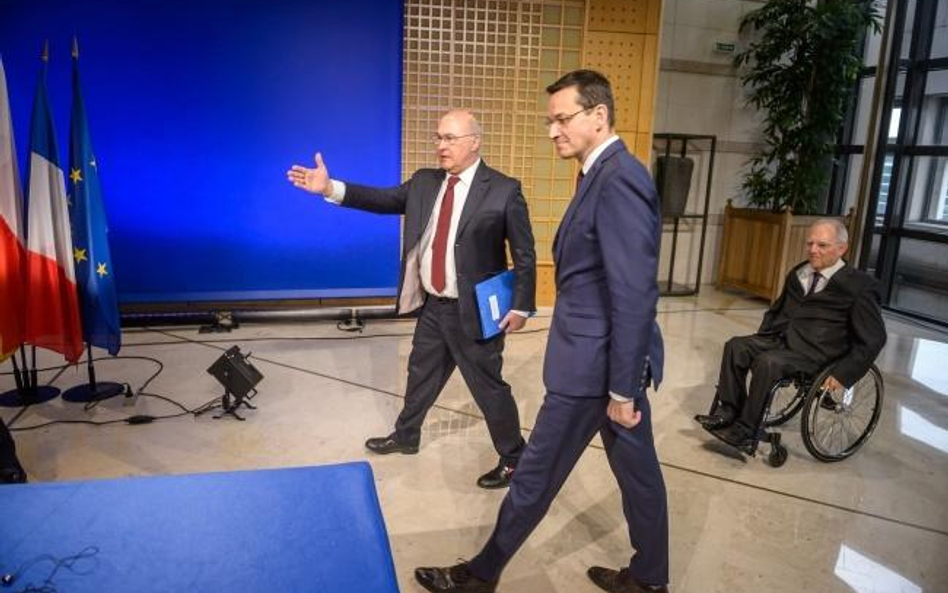 Ministrowie finansów: Francji Michel Sapin, Polski Mateusz Morawiecki i Niemiec Wolfgang Schaeuble