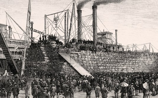 Parowiec w porcie Nowego Orleanu załadowany belami bawełny, USA. Grawerowana ilustracja z „La Nature