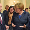 François Hollande (pierwszy z prawej) i Angela Merkel zaakceptowali politykę Władimira Putina