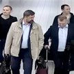 Czterej agenci GRU po przylocie na lotnisko w Hadze afp
