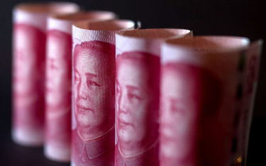 Fala pieniądza zalewa Chiny. Tylko 6 juanów za dolara?