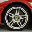 Akcje czy auto Ferrari?