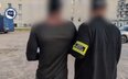 Policja zatrzymała trzech Nigeryjczyków i Polkę, podejrzanych o oszustwa. Zdjęcie (kadr z nagrania u