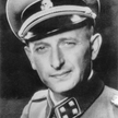 Adolf Eichmann (1906–1962). Zdjęcie, wykonane późną jesienią 1941 r., przedstawia Eichmanna w mundur