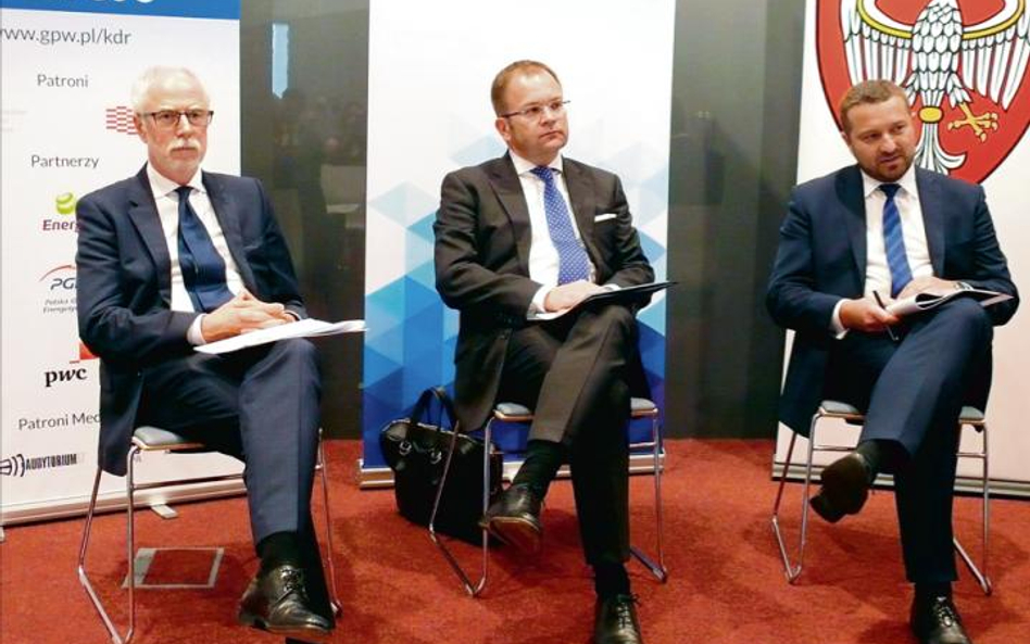 Wiceprezes PwC Jacek Socha (od lewej), Grzegorz Zawada z zarządu GPW i Hubert Zobel z Urzędu Wojewód