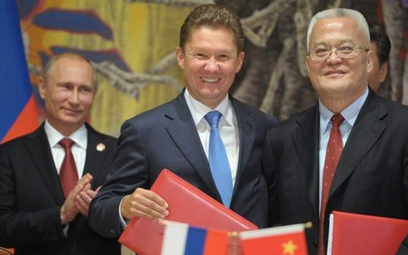 Prezydent Rosji Władimir Putin, szef Gazpromu Aleksiej Miller i szef China National Petroleum Corpor