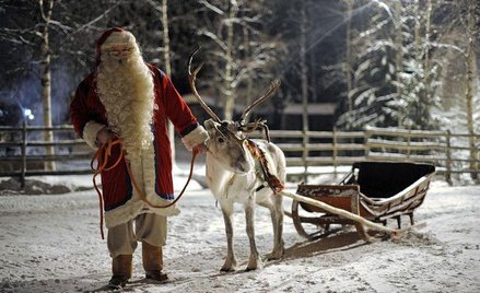 Święty Mikołaj z jednym ze swych reniferów