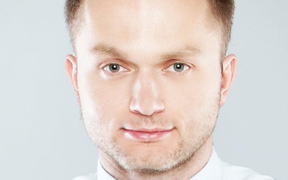 Wojciech Stępień, CFA analityk, Raiffeisen Polbank