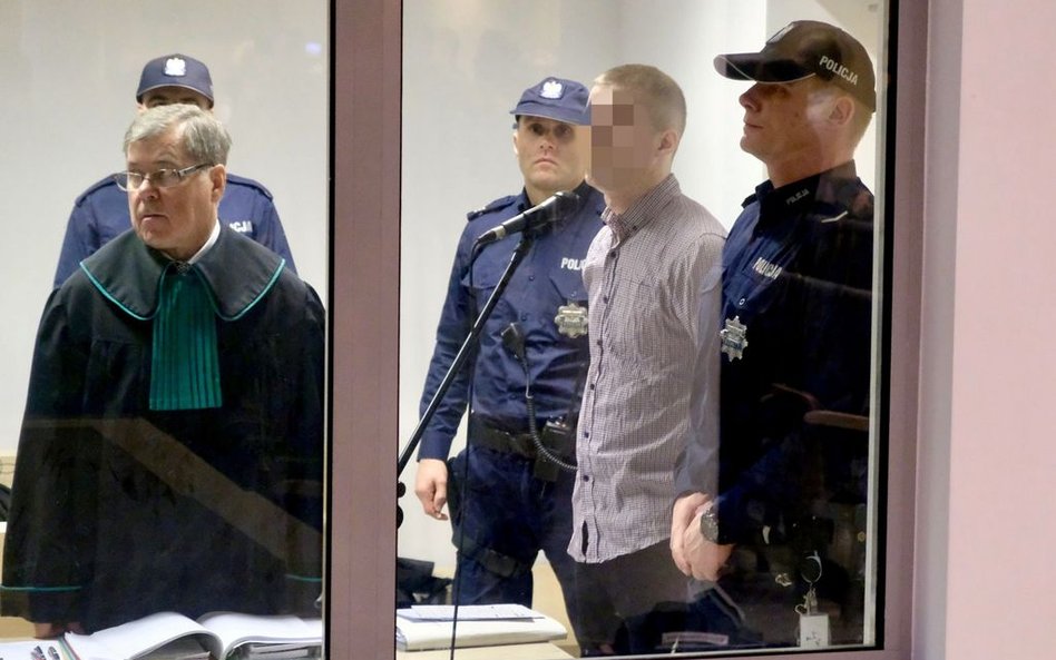 Oskarżony Adam Z. i adwokat Ireneusz Adamczak na sali rozpraw w Sądzie Okręgowym w Poznaniu