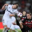 Piłkarz Legii Warszawa Blaz Kramer (L) i Stefan Gartenmann (P) z FC Midtjylland