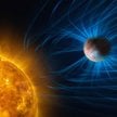 Ilustracja przedstawiająca aktywność magnetyczną egzoplanety, gazowego olbrzyma podobnego do Jowisza