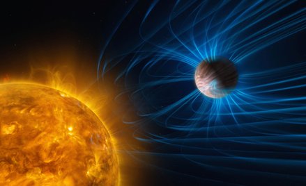 Ilustracja przedstawiająca aktywność magnetyczną egzoplanety, gazowego olbrzyma podobnego do Jowisza