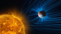 Ilustracja przedstawiająca aktywność magnetyczną egzoplanety, gazowego olbrzyma podobnego do Jowisza
