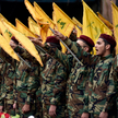 Bojownicy Hezbollahu w trakcie pogrzebu zmarłego bojownika Husseina Ahmeda Hamdana.