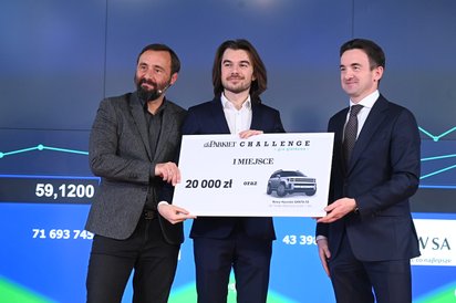 Cezary Szymanek (z lewej), redaktor naczelny „Parkietu”, wraz z prezesem GPW Tomaszem Bardziłowskim 