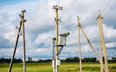 Właściciele działek coraz częściej domagają się wynagrodzenia za słupy i linie energetyczne stojące 