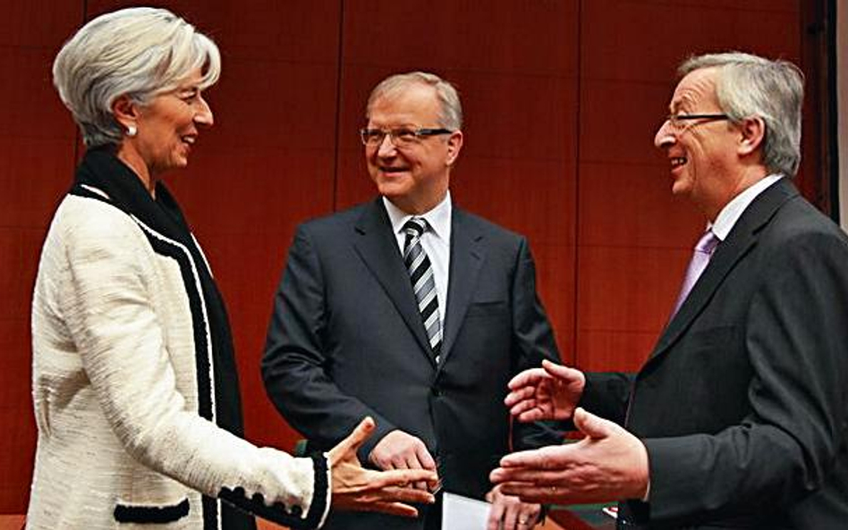 Francuska minister finansów Christine Lagarde, komisarz UE ds. walutowych Olli Rehn i minister finan