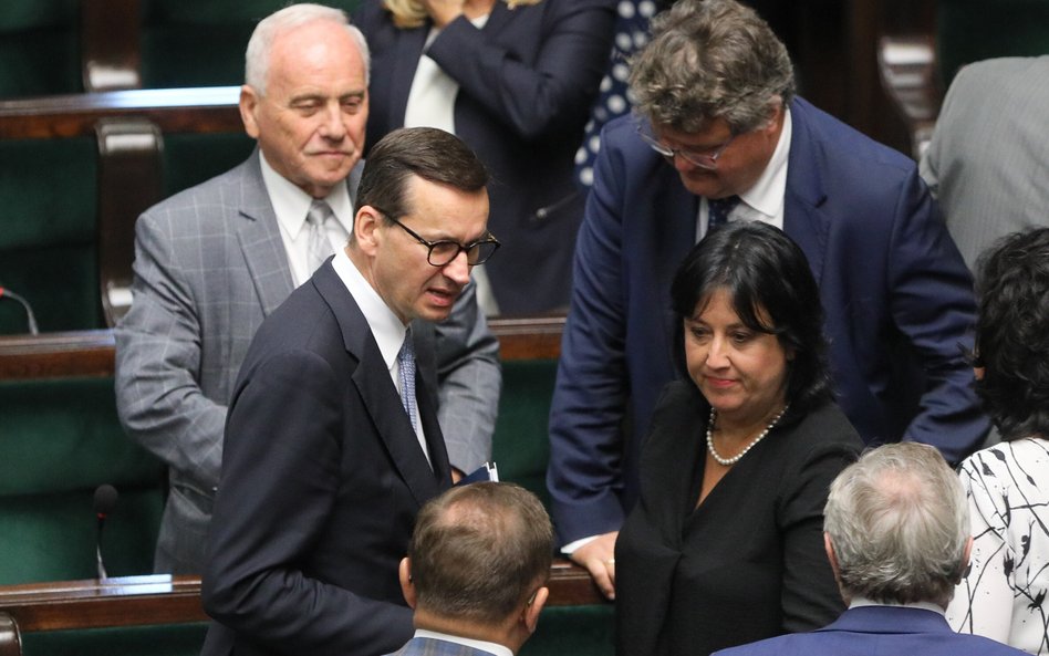 Premier Mateusz Morawiecki  i wiceminister rodziny i polityki społecznej Anita Czerwińska na sejmowe