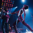 Gwilym Lee w roli Briana Maya i Rami Malek jako Freddie Mercury w filmie „Bohemian Rhapsody”