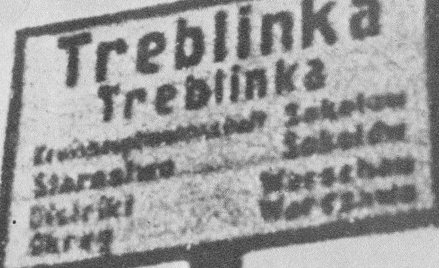 Tabliczka przy wjeździe do wsi Treblinka (w języku polskim i niemieckim)