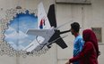 Mural w mieście Shah Alam przedstawiający MH370