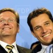 Niemiecki minister spraw zagranicznych Guido Westerwelle (z lewej) i jego homoseksualny partner Mich