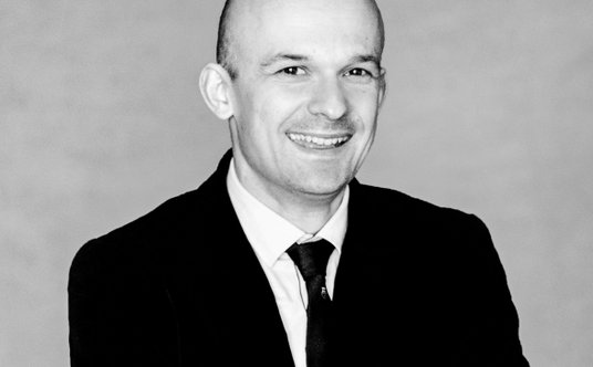 Michał Krasiński, radca prawny w dziale nieruchomości i prawa budowlanego w kancelarii prawnej Scham