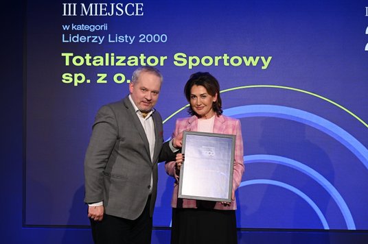Beata Stelmach, prezes Totalizatora Sportowego, firmy nr 3 na Liście 2000, oraz Michał Szułdrzyński,