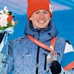 Rosyjski biegacz narciarski Denis Spicow na podium ze srebrem za bieg łączony