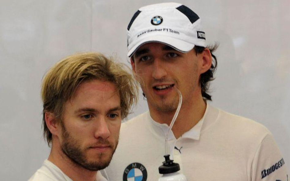 Robert Kubica (P) i jego dawny partner z BMW Sauber Nick Heidfeld (L)