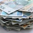 Waluty: złoty pozostaje pod presją. Uwaga skupiona na kursie euro do dolara