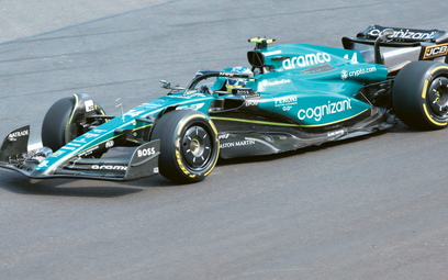 Aston Martin's Spanish driver Fernando Alonso steers his car during the Formula One Azerbaijan Grand