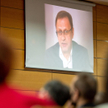 Włodzimierz Bodnar (na ekranie) podczas styczniowego sympozjum „Oblicza pandemii” w Akademii Kultury