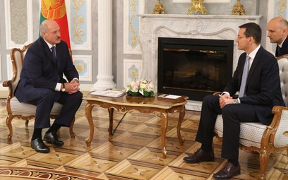 Prezydent Białorusi Aleksandr Łukaszenko i wicepremier RP Mateusz Morawiecki