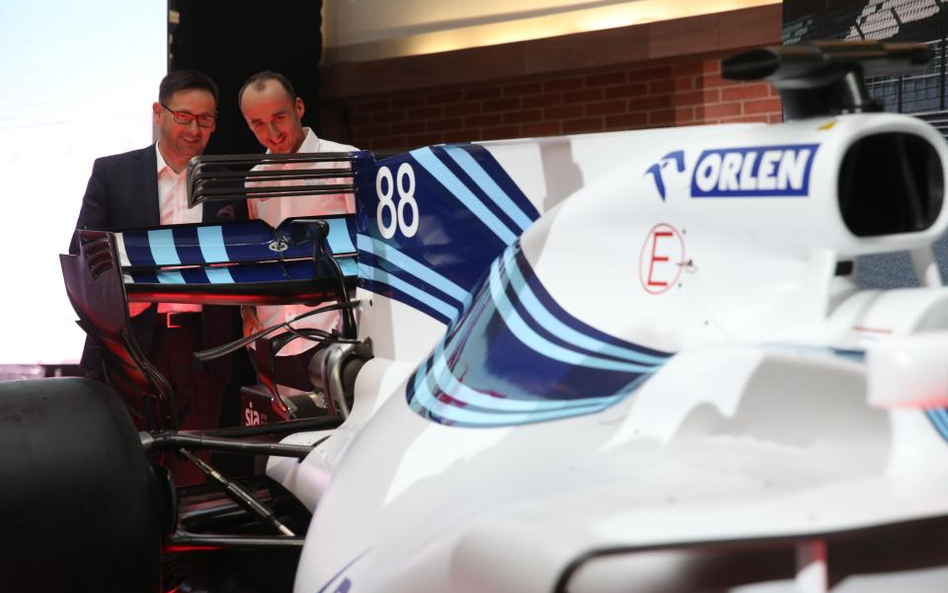 Prezes PKN Orlen Daniel Obajtek i Robert Kubica
