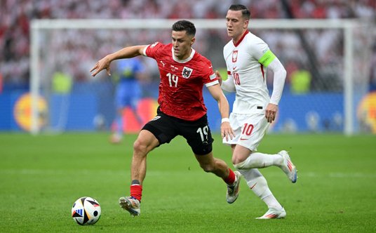 Piotr Zieliński i Christoph Baumgartner podczas meczu Euro 2024 Polska-Austria