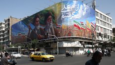 Porozumienie USA z Iranem ma być blisko. Na zdjęciu: billboard z wizerunkami ajatollaha Chomeiniego 